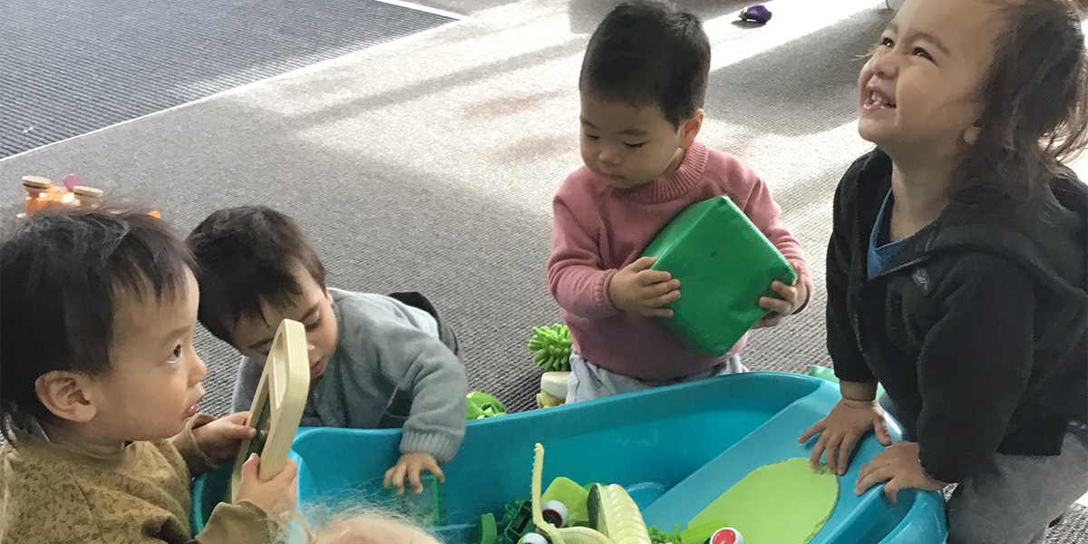 Playing with green toys 